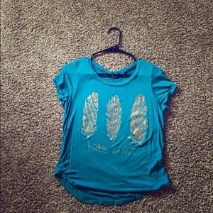 Blue T-shirt with design.